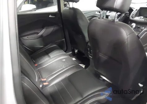 2016 Ford Escape Titanium z USA, uszkodzony, nr VIN 1FMCU9J97GUC36498